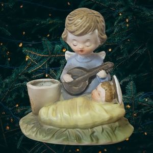 Vintage 1963 Holt Howard angel and baby candle holder figurine.
